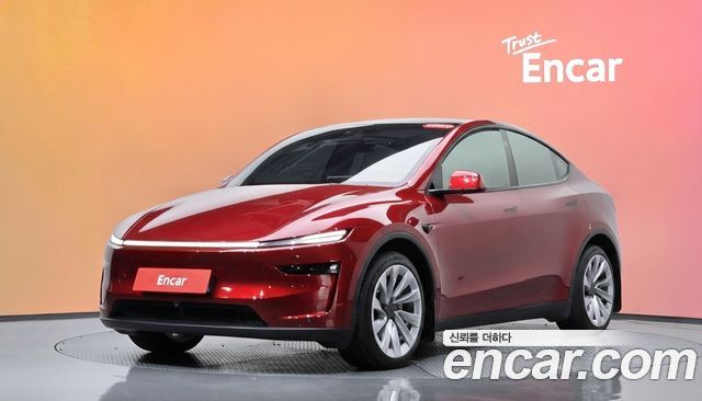 Tesla Model Y 2025 — photo 1