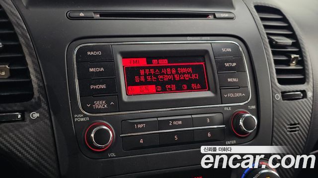 Kia K3 2014 — photo 16