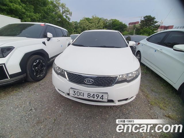 Kia Porte 2011 — photo 1