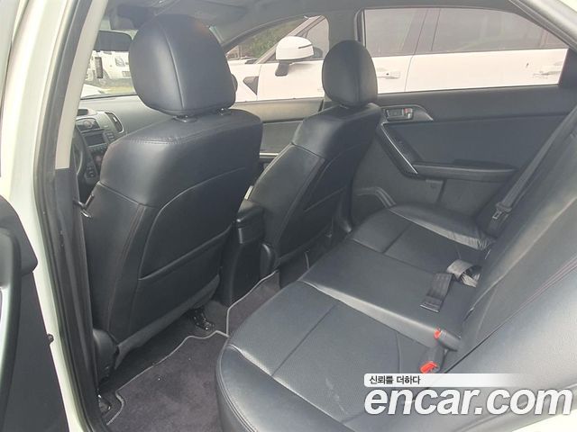 Kia Porte 2011 — photo 8