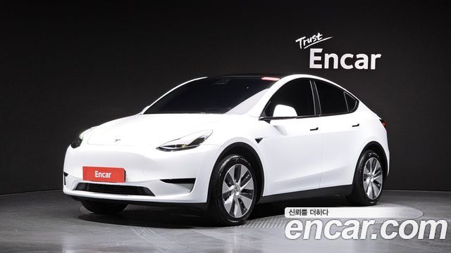 Tesla Model Y 2023 — photo 35