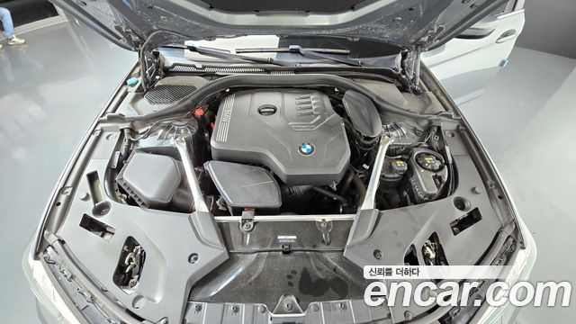 BMW 5-Series 2023 — photo 10