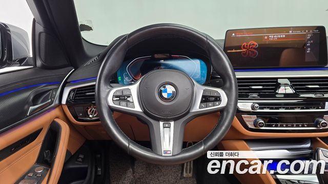 BMW 5-Series 2023 — photo 13