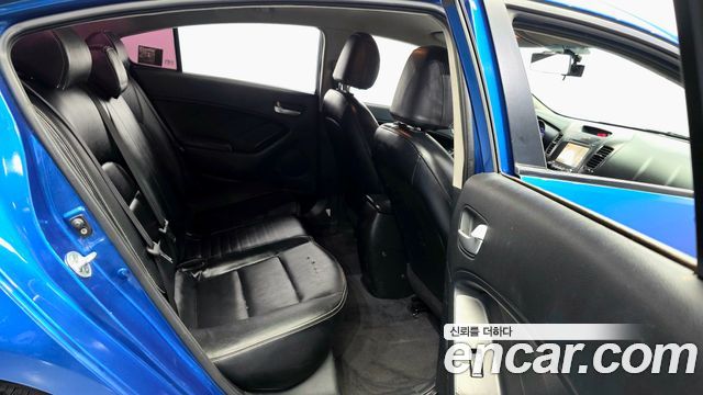 Kia K3 2013 — photo 18