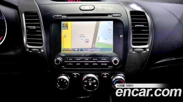 Kia K3 2013 — photo 21