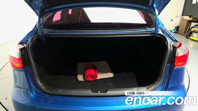 Kia K3 2013 — photo 26