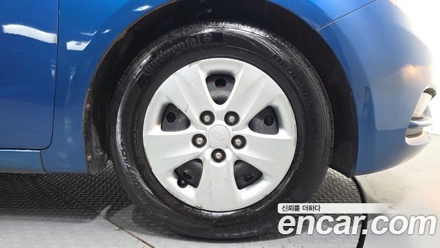 Kia K3 2013 — photo 7