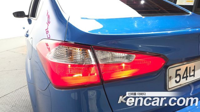 Kia K3 2013 — photo 9