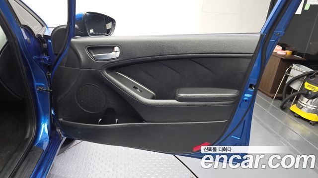 Kia K3 2013 — photo 14