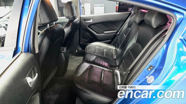 Kia K3 2013 — photo 16