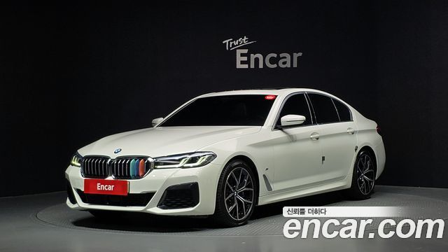 BMW 5-Series 2023 — photo 1