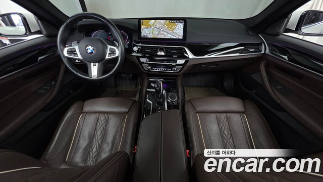 BMW 5-Series 2023 — photo 10