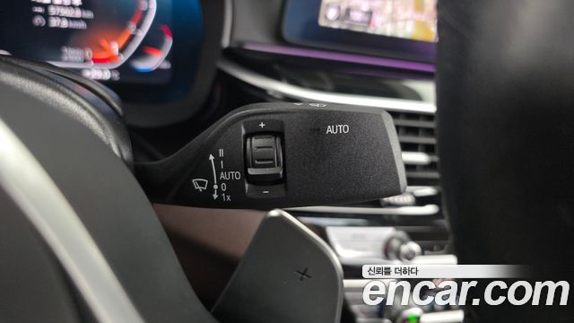 BMW 5-Series 2023 — photo 29