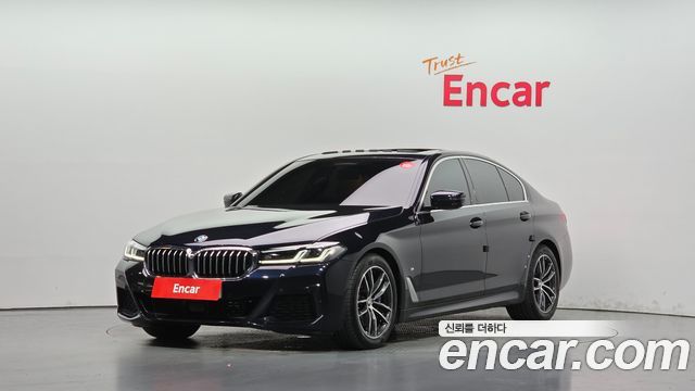 BMW 5-Series 2022 — photo 1
