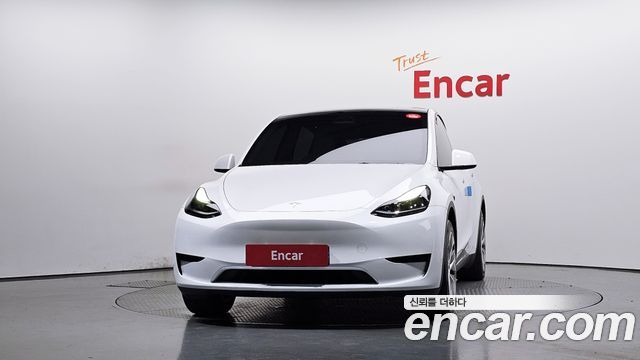 Tesla Model Y 2024 — photo 3