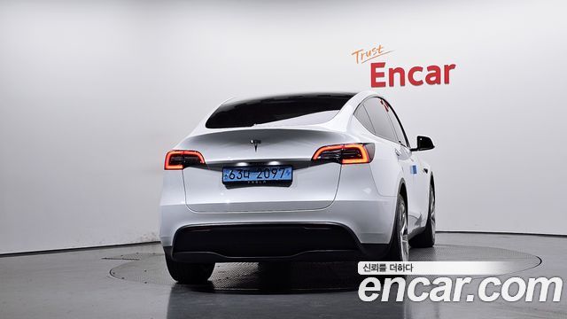 Tesla Model Y 2024 — photo 4