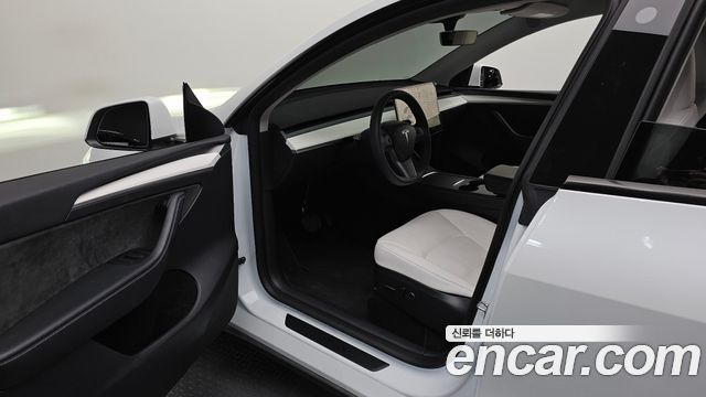 Tesla Model Y 2024 — photo 10