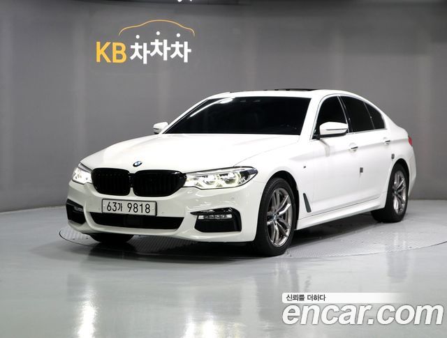 BMW 5-Series 2018 — photo 1