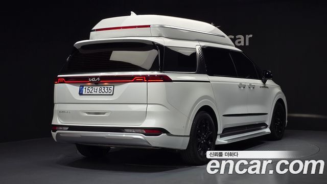Kia Canival 2022 — photo 2