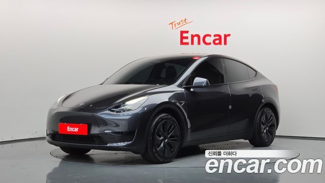 Tesla Model Y 2025 — photo 1