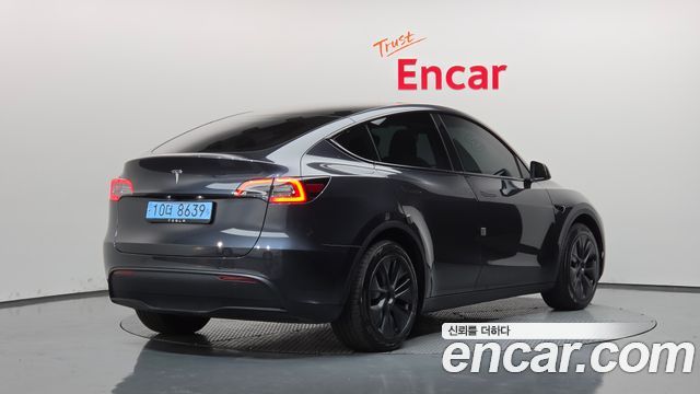 Tesla Model Y 2025 — photo 2