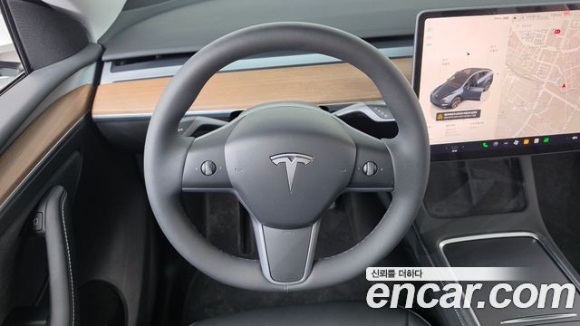 Tesla Model Y 2025 — photo 19