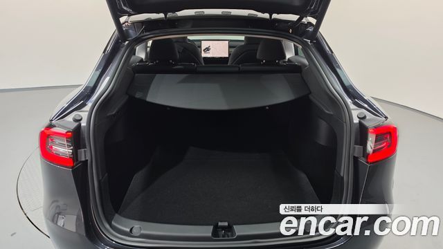 Tesla Model Y 2025 — photo 23