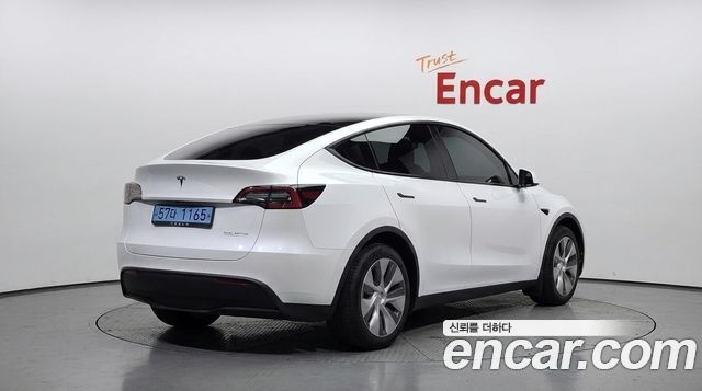 Tesla Model Y 2021 — photo 2