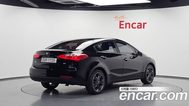 Kia K3 2013 — photo 2