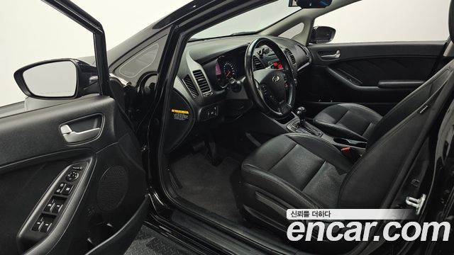 Kia K3 2013 — photo 17