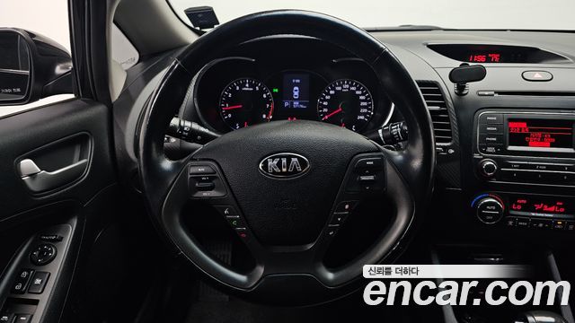 Kia K3 2013 — photo 19