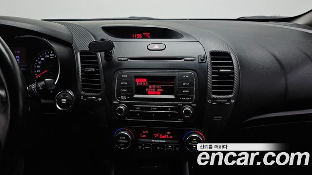 Kia K3 2013 — photo 20
