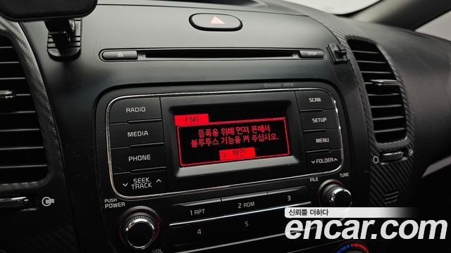 Kia K3 2013 — photo 21