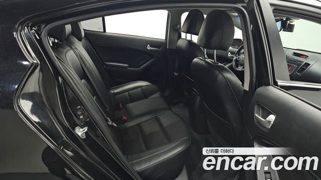 Kia K3 2013 — photo 16