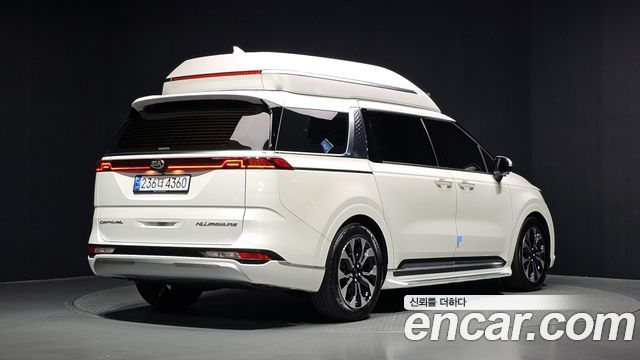 Kia Canival 2021 — photo 2