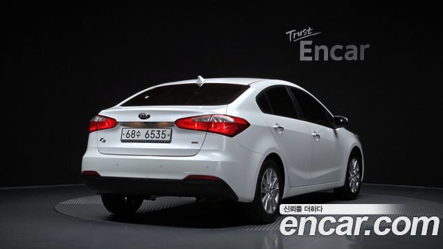 Kia K3 2013 — photo 2