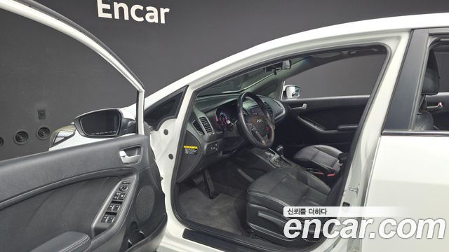 Kia K3 2013 — photo 10