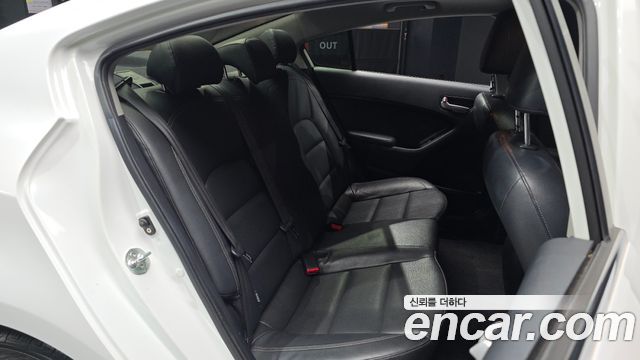 Kia K3 2013 — photo 11