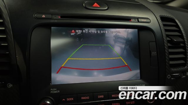 Kia K3 2013 — photo 14