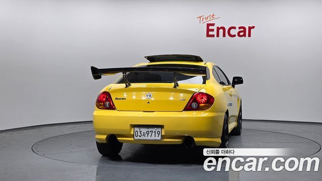 Hyundai Tuscani 2002 — photo 4
