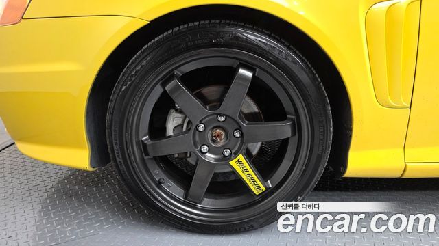 Hyundai Tuscani 2002 — photo 5