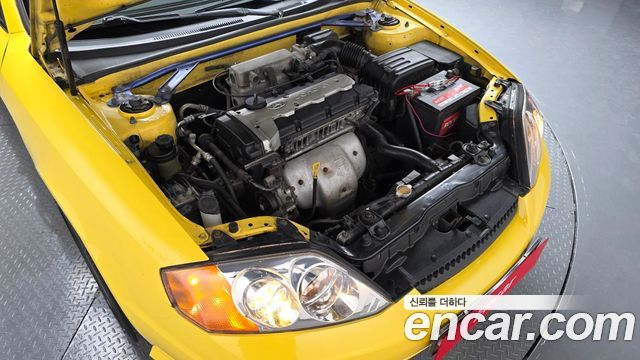 Hyundai Tuscani 2002 — photo 6