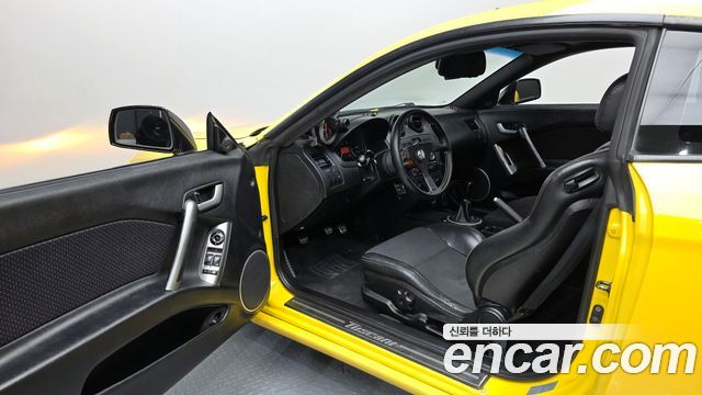 Hyundai Tuscani 2002 — photo 10