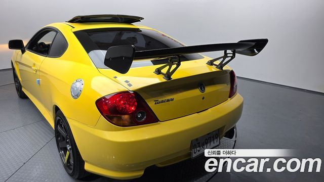 Hyundai Tuscani 2002 — photo 20