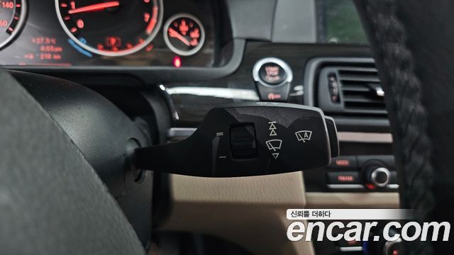 BMW 5-Series 2012 — photo 24