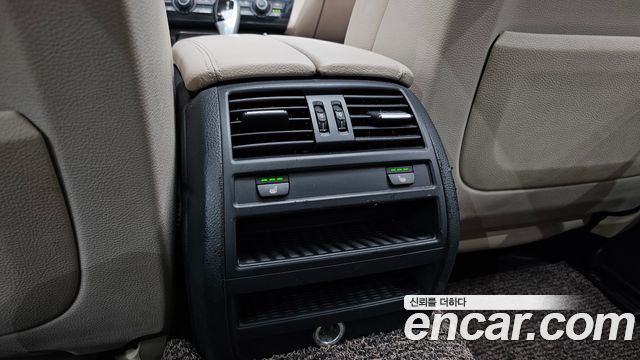 BMW 5-Series 2012 — photo 28