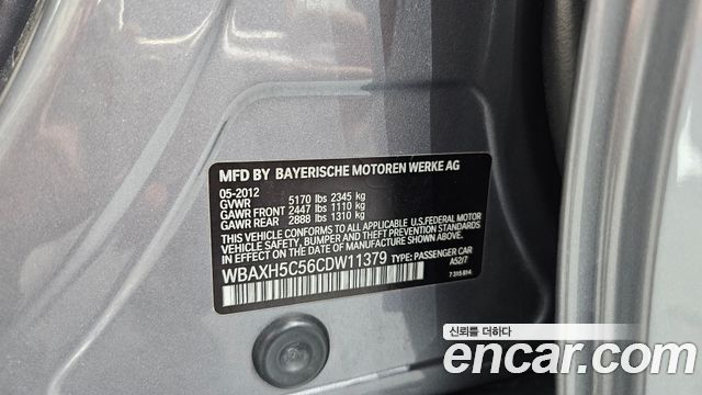 BMW 5-Series 2012 — photo 31