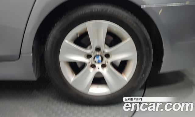 BMW 5-Series 2012 — photo 38
