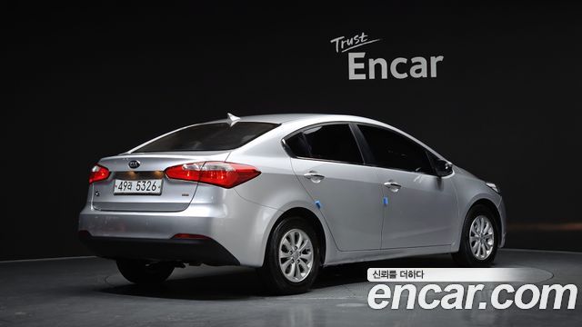 Kia K3 2013 — photo 2