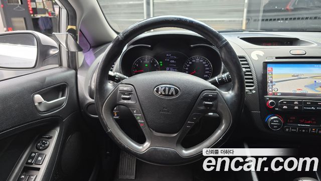 Kia K3 2013 — photo 13